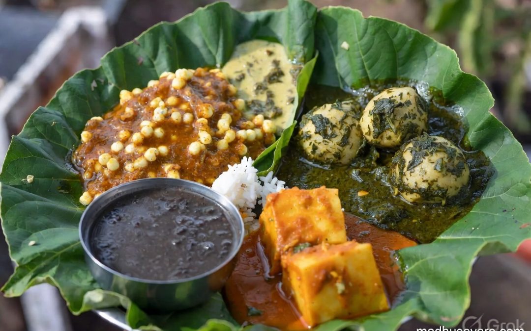 Authentic Mandyali Dham thali served on traditional leaf pattal with Sepu Vadi, Kaddu ka Khatta, Madra, Boondi ka Meetha and rice