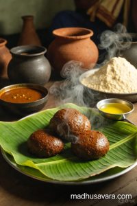 Traditional steaming hot Ragi Mudde served with sambar and ghee in a village kitchen