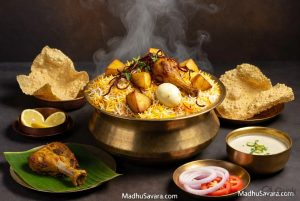 Steaming hot authentic Kolkata Biryani Recipe with chicken, potatoes, boiled eggs, saffron rice and fresh herbs in brass handi